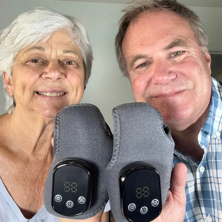 Happy customers holding the foot therapy device