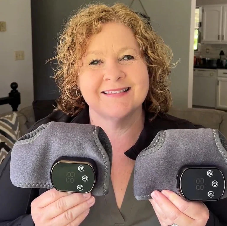 Customer smiling while holding two foot therapy devices