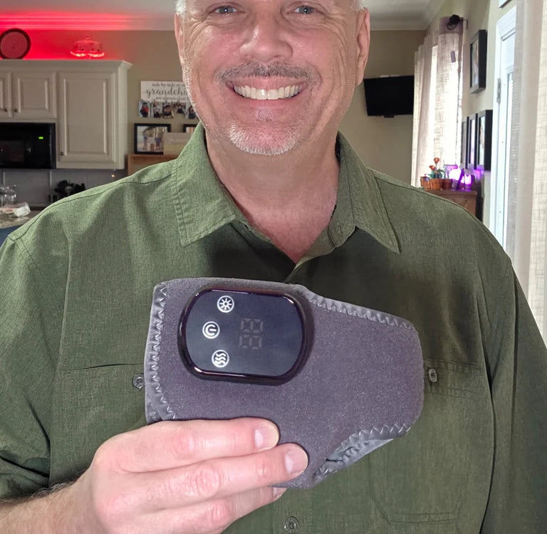 Customer holding the foot therapy device